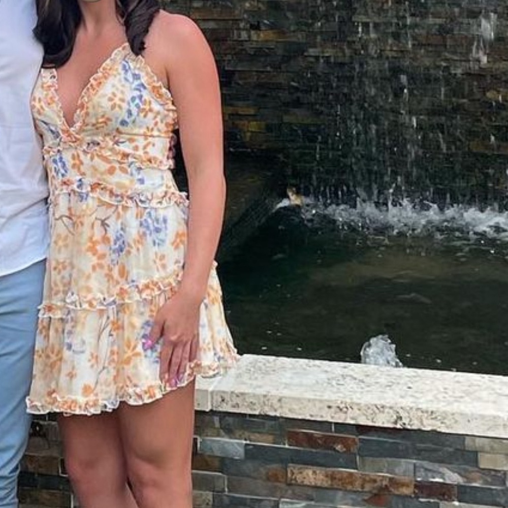 Women’s XSmall Floral Mini dress. Pops of orange, white, and blue.